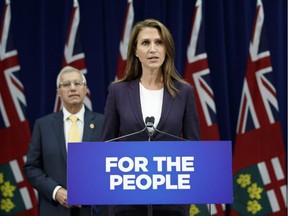 Ontario's Attorney General Caroline Mulroney and Minister of Finance Vic Fedeli speak in Toronto about new legislation for selling marijuana, Sept. 26, 2018.