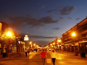 Pedestrians walk up and down Erie Street during the Italian Carrousel Of The Nations in 2008.