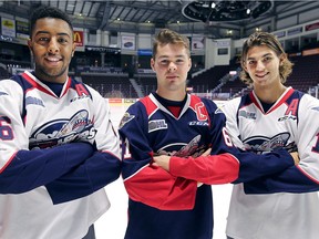 The Windsor Spitfires newly named captain Luke Boka, centre, is shown with alternate captains Cole Purboo, left, and Chris Playfair on Wednesday.