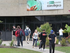 Students are shown near the main entrance to the St. Clair College main campus on Thursday, September 27, 2018. Enrolment is at an all time high at the school.