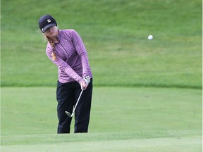 Gold-medal winner Hailey Katona, of Tilbury, chips onto the green on the ninth hole on Thursday  at Ambassador's Golf Course during OFSSA Girls championship.