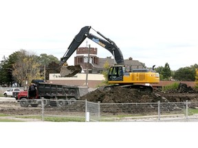 Work has begun on the Farrow Riverside Miracle Park on the site of the former Riverside Arena. In photo, an excavator with SheaRock Construction removes dirt, fill and debris, which will be replaced with clay and gravel, a proper base for the special playground surface.