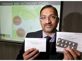 Dr. Wajid Ahmed, Acting Medical Officer of Health, with potassium-iodide pills the Windsor-Essex Health Unit will distribute next Wednesday.