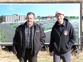 Developer Norbert Bolger, left, of Nor Built Construction and Amherstburg Mayor Aldo DiCarlo on the site of a proposed hotel and plaza project October 18, 2018.