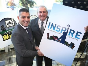 Windsor Family Credit Union executives Eddie Francis, left, and Marty Gillis announce details of the new Community Engagement Program 'INSPIRE' during a news conference October 24, 2018.