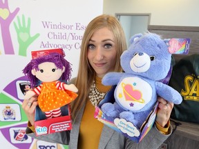 Michelle Oake, executive director of Windsor Essex Child/Youth Advocacy Centre holds donated teddy bears in the family waiting area of the newly-opened office located at the Anthony Toldo Centre for Applied Health Sciences on main campus of St. Clair College October 24, 2018. The charitable organization supports children and youth who report abuse.  WECYAC has two rooms furnished and are looking for more financial support from the community.