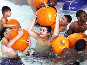 Grade 4/5 students with Immaculate Conception Catholic School show their excitement during the launch of Pumpkin Splash at Adventure Bay Family Water Park Presented by WFCU Credit Union on Oct. 24, 2018.  Billed as Windsor's only floating pumpkin patch, children who attend Adventure Bay can bob to pick their own pumpkin, then decorate with a variety of arts and crafts.