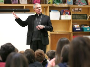 Bishop of London, Ronald Fabbro speaks to grade 5/6 students at St. John the Baptist Catholic Elementary School in Belle River October 25, 2018.  Bishop Fabbro spent the day visiting schools talking about vocations within the church.