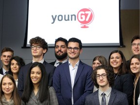 Italian official Lorenzo Micheli, centre, poses with both Assumption High School students and Italian students during the kick-off event for Global YounG7 Summit Simulation at Catholic Education Centre on Oct. 30, 2018.