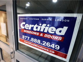 Doors are locked and lights are out at Certified Windows and Doors on Tecumseh Road East on Oct. 31, 2018.