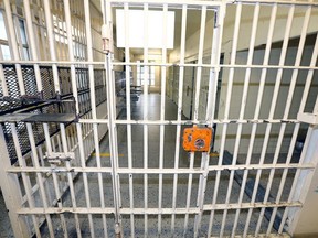 Multiple heavy-steel doors are seen inside the women's cell block at Windsor Jail.