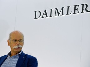 German automaker Daimler AG Chairman of the Board of Managment Dieter Zetsche takes part in a press conference during the press days of the Paris Motor Show on October 3, 2018.