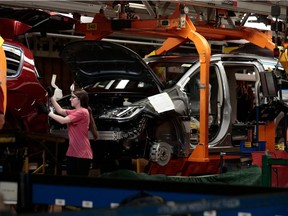 Workers are seen at the FCA Windsor Assembly on Oct. 5, 2018 in Windsor.