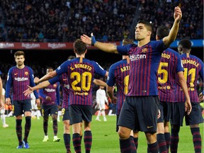 Barcelona's Uruguayan forward Luis Suarez celebrates during the Spanish league football match between FC Barcelona and Real Madrid CF at the Camp Nou stadium in Barcelona on October 28, 2018.