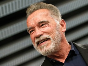 Arnold Schwarzenegger smiles as he attends a street marketing event ahead of the fitness and bodybuilding Arnold Classic Europe event in L'Hospitalet del Llobregat on September 28, 2018. (PAU BARRENA/AFP/Getty Images)