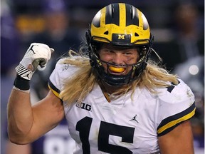 FILE - In this Sept. 29, 2018, file photo, Michigan's Chase Winovich reacts during an NCAA college football game in Evanston, Ill. The senior defensive end is the top player on the nation's top-ranked defense.