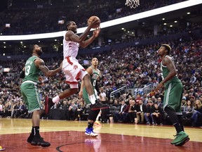 Toronto Raptors forward Kawhi Leonard (2) scores on the Boston Celtics during second half NBA action in Toronto on Oct. 19, 2018.