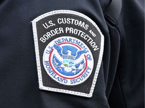 The crest of a U.S. Customs and Border Protection officer is shown during a press conference on Wednesday, October 17, 2018, in Detroit.