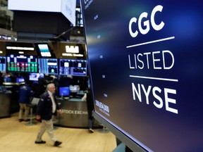 The logo for Canada's Canopy Growth Corp. appears on a screen above a trading post on the floor of the New York Stock Exchange, Thursday, May 31, 2018.