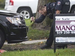 Windsor police and EMS respond to a 4-year-old boy who was struck by a vehicle on Elsmere Ave., next to Giles Campus Public School as school was being released on Wednesday, Oct. 31, 2018.