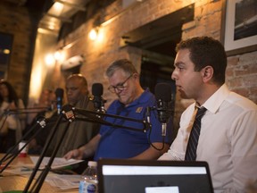 Ward 2 incumbent John Elliott debates challenger Fabio Costante at Sandwich Brewing Co., for Ballots and Brews, Tuesday, Oct. 16, 2018.