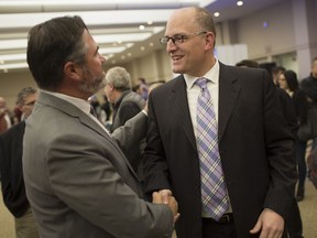 Mayor Drew Dilkens congratulates Ward 9 councillor-elect, Kieran McKenzie at the St. Clair Centre for the Arts on Oct. 22, 2018.