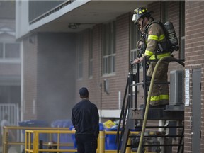 Windsor firefighters deal with a garbage fire at 1545 Ouellette Ave, Monday, Oct. 22,  2018.  No injuries were reported.