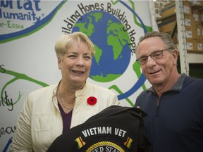 Kim Davis, left, a member of the board of directors at Habitat for Humanity, and Al Howlett, 69, a Vietnam War veteran, are pictured at the Habitat's ReStore, October 29, 2018.  Both are heading to Vietnam to join a team of 30 Canadian volunteers as well as others from around the world to build 26 homes.