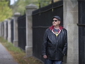 Ward 4 Coun. Chris Holt, a member of the Willistead Manor board of directors, is shown at Willistead Park, Oct. 19, 2018, next to a heritage fence in need of repairs.