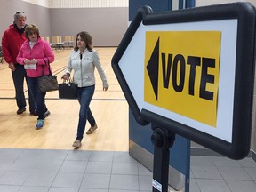Voters are seen at the Capri Pizzeria Recreation Complex in Windsor on Oct 22, 2018.