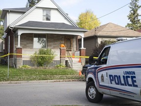 Police investigate a shooting at 670 Trafalgar St. in London on Sunday. (Derek Ruttan/The London Free Press)