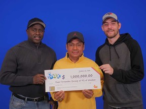 From left: James Kollie Jr., Juan Fernandez, and William Widmeyer - part of a group of 37 Lotto MAX players from Windsor-Essex who get to split a million dollars that they won from a Maxmillions draw in June 2018.