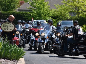 Stories are what people remember about an individual, says Families First Funeral Homes’ vice president Jennifer Wells. Above, a motorcycle honour guard gathered for a loved one who was fond of his bike.
