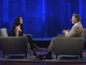 This image released by ABC shows host Alec Baldwin, right, speaking with TV personality Kim Kardashian West during an appearance on "The Alec Baldwin Show," which premiers Sunday, Oct. 14 on ABC.