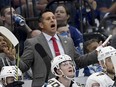 Former Windsor Spitfires' owner and head coach Bob Boughner was hired as associate coach by the Detroit Red Wings on Friday.