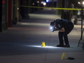 Windsor police investigate an early morning shooting on Ouellette Avenue at Maiden Lane in downtown Windsor on Oct. 5, 2018.