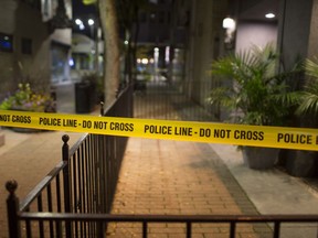 Windsor police investigate an early morning shooting on Ouellette Avenue at Maiden Lane in downtown Windsor on Oct. 5, 2018.