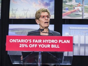 Ontario Premier Kathleen Wynne announces cuts to hydro rates on average of 25 per cent during a press conference in Toronto on March 2, 2017.