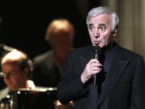 FILE - In this Dec.17, 2007 file photo, Charles Aznavour, a French singer of Armenian origin, performs during a concert in Marseille, southern France. Charles Aznavour, the French crooner and actor whose performing career spanned eight decades, has died. He was 94.