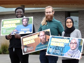 University of Windsor students David Adelaja, left, Max Arvidsson and Amal Siddiqui, right, display their posters during Windsor Proud, a new  campaign featuring current students telling their University of Windsor stories, November 2, 2018. The Event was held at Stephen and Vicki Adams Welcome Centre on Wyandotte Street West.