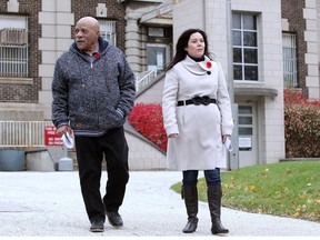 Former Windsor councillor and retired Windsor Fire District Chief Ron Jones, left, walks with Windsor West MPP Lisa Gretzky at the old Windsor Jail Wednesday Nov. 7, 2018.