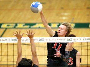 Windsor, Ontario. November 9, 2018.  Spencer Campeau, seen spiking the ball, and the Essex Red Raiders made it back-to-back WECSSAA senior boys' AA volleyball titles on Saturday.