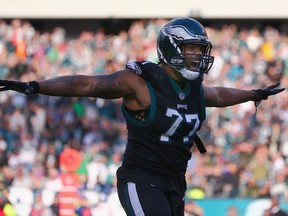 Defensive end Michael Bennett #77 of the Philadelphia Eagles celebrates a sack against the New York Giants during the third quarter at Lincoln Financial Field on November 25, 2018 in Philadelphia, Pennsylvania. The Philadelphia Eagles won 25-22.