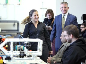 The Hon. Chrystia Freeland, left, Minister of Foreign Affairs visits an engineering lab during a tour of the Centre for Engineering Innovation at the University of Windsor on November 13, 2018.  Joining Minister Freeland was University of Windsor president Douglas Kneale, centre right.