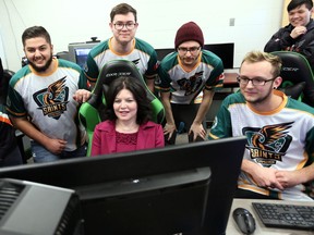 St. Clair College president Patti France, centre, plays Rocket League with members of the St. Clair College varsity eSports team as St. Clair College announced the launch of eSports Administration and Entrepreneurship Program starting in 2019.  Already, St. Clair College was the first post-secondary institution in Canada to have an eSports varsity team which has won competitions against some larger U.S. colleges. Now, St. Clair College will be offering a two-year diploma program designed to prepare students to be employed in the expanding eSports industry.