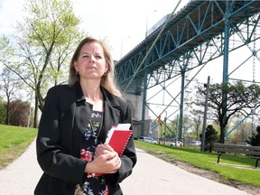 Jane McArthur, PhD Candidate, Department of Sociology, Anthropology and Criminology at University of Windsor is photographed near the Ambassador Bridge on May 14, 2018.