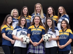 Windsor, Ontario. November 15, 2018 -- Local soccer players Emma Miner, front left, Elizabeth Elliott, Alexa Mognon, Emma Raoux, Ancika Quimby and Megan Murtagh, top left, Nicole Hogeterp, Haley Smith, Natalie Hogeterp and Megan Bornais, top right, have committed to the U of W Lancers women's varsity soccer team November 15, 2018.