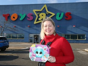 Toys 'R' Us Canada President Melanie Teed-Murch with hot-selling Scruff a Luvs in Windsor November 20, 2018.