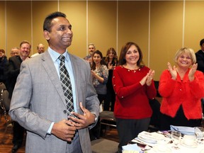 Rakesh Naidu, COO of WindsorEssex Economic Development Commission receives a standing ovation after it was announced that he will be the new president and CEO of Windsor-Essex Regional Chamber of Commerce at the Chamber's Annual General Meeting held at Hellenic Cultural Centre on Nov. 21, 2018.