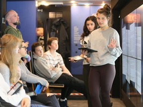 Tecumseh Vista Academy Grade 10 students Olivia Hadjissarris, right, and Sophia Vidinovski, behind, present answers inside the Holodomor Mobile Classroom Monday Nov. 26, 2018. Students participated in lively group discussions while learning about the Ukrainian genocide.  This year marks the 85th anniversary of Holodomor, which refers to the genocidal starvation of millions of Ukrainians in 1932-33.  A mobile classroom, currently touring the country to inform Canadians about the Ukrainian genocide, will visit 5 GECDSB secondary schools this week.
